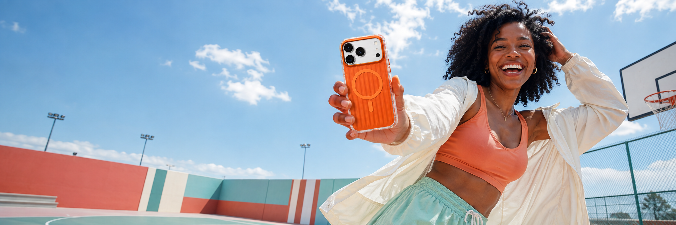 Model using an orange CaseBear Ribbed MagSafe case for iPhone 17 Pro Max