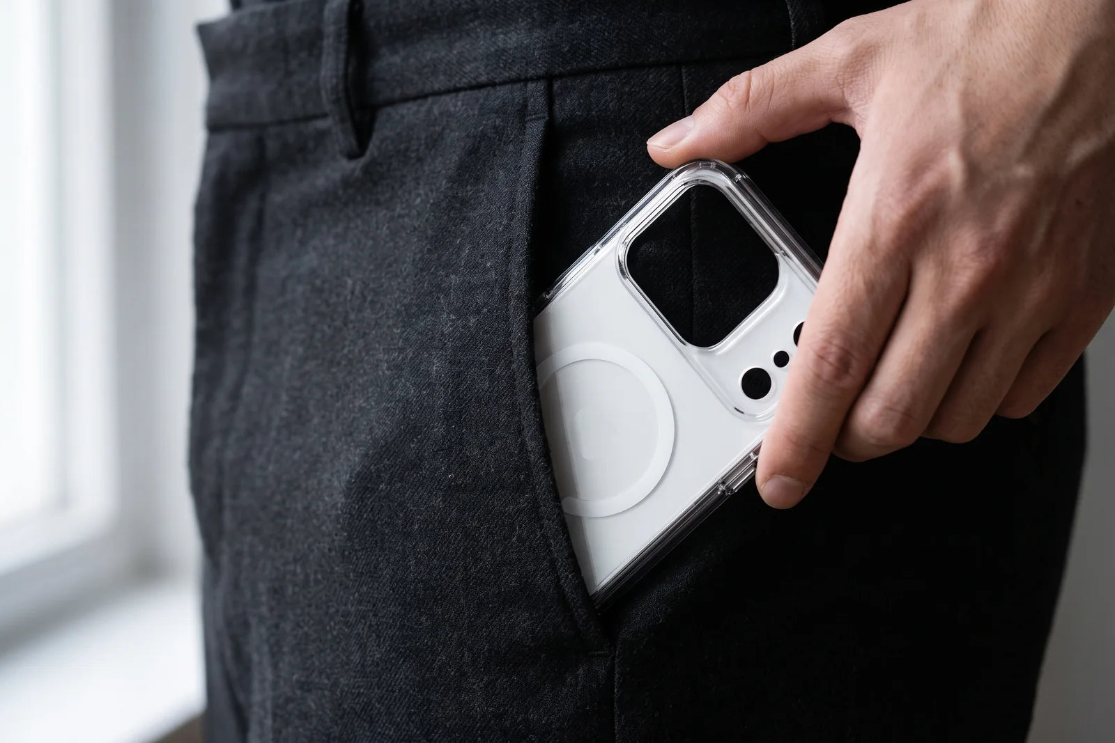 Slim CaseBear phone case sliding easily into a pocket